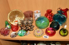 A GROUP OF GLASSWARES, to include a Millefori paperweight/dumpy weight, cranberry coloured glass etc