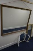 A MODERN RECTANGULAR BEVELLED EDGE WALL MIRROR, 130cm x 100cm, another wall mirror and a triple