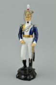 A ROYAL WORCESTER FIGUER FROM HISTORICAL MILITARY FIGURES SERIES, 'Officer of the 17th Dragoon