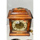 AN ELLIOT BRACKET CLOCK BY J.W.BENSON, LONDON, brass dial with Roman numerals, brass carry handle