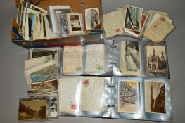 A QUANTITY OF POSTCARDS, loose and loosely inserted in two albums, Edwardian to late 20th Century