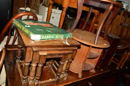 AN OAK NEST OF THREE TABLES, an oak circular occasional table, an oak smokers cabinet, etc (5)