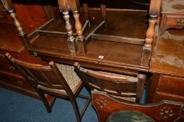 AN OAK DRAW LEAF TABLE and four chairs (5)