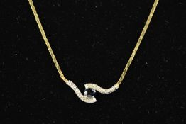 A 9CT GOLD SAPPHIRE AND DIAMOND NECKLACE designed as an oval sapphire within a curved cross over