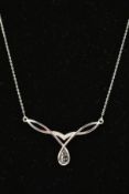 A 9CT WHITE GOLD DIAMOND NECKLACE designed as V-shaped open scrolling panel set with diamonds with