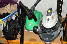 AN EARLEX WALLPAPER STRIPPER, an Oreck vacuum cleaner and another vacuum cleaner (3)