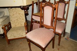 A 20TH CENTURY OAK RECLINING ARMCHAIR and a set of four Edwardian oak high back dining chairs (5)