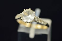 A 9CT GOLD GEM RING designed as a central circular colourless gem assessed as a colourless spinel to