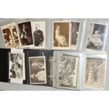 A POSTCARD ALBUM, loosely inserted, collection of cards from Victorian to mid 20th century showing