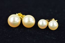 TWO PAIRS OF AKOYA CULTURED PEARL EARRINGS to include a larger pair, pearls measuring