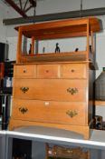 A STAG OAK CHEST OF FIVE DRAWERS and a teak coffee table (2)