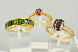 THREE 9CT GOLD GEM SET RINGS to include a diopside half eternity ring channel set with seven