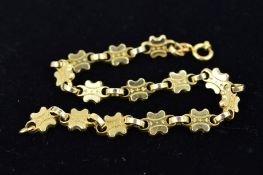 A 9CT GOLD FANCY DECORATED PANEL BRACELET measuring approximately 170mm in length, partial