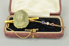 TWO EARLY 20TH CENTURY BROOCHES to include a 9ct gold bar brooch set with a sapphire, diamond and