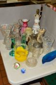 A GROUP OF DECORATIVE GLASSWARE to include a white flash cut lamp, decanters, candlesticks and vases