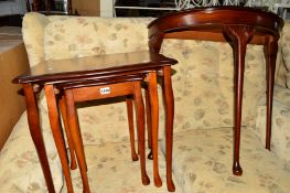 A MODERN MAHOGANY NEST OF THREE TABLES, a half moon table and a tripod table (3)
