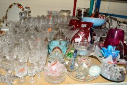 A QUANTITY OF CUT/COLOURED GLASSWARES, to include decanters, drinking glasses, vases, paperweights