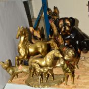 EIGHT ANIMAL SCULPTURES, to include a ceramic Alsatian and Jack Russell, together with brass horses,