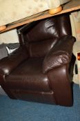 A BROWN LEATHER ELECTRIC RECLINING ARMCHAIR