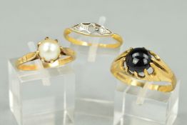 THREE GEM SET RINGS, the first designed as an open marquise shape panel set with two single cut