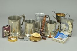 A SMALL BOX OF JEWELLERY AND NOVELTIES to include a small EPNS trophy, four tankards, mainly pewter,