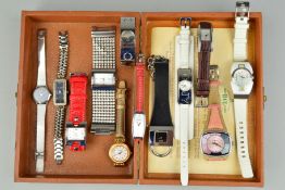 A HINGED BOX OF LADIES WRIST WATCHES to include five DKNY watches, two Diesel watches, two D & G