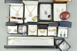 A SELECTION OF GEM JEWELLERY to include topaz pendants, earrings, rings and a bracelet, a matching