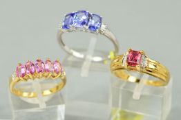 THREE 9CT GOLD MODERN ASSORTED GEM SET DRESS RINGS to include a pink tourmaline and diamond