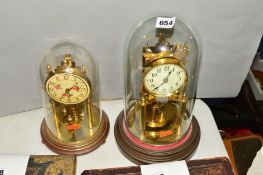 A GUSTAV BECKER BRASS ANNIVERSARY CLOCK, under glass dome, approximate height 28cm (includes base