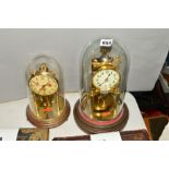 A GUSTAV BECKER BRASS ANNIVERSARY CLOCK, under glass dome, approximate height 28cm (includes base