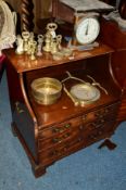 A GEORGIAN MAHOGANY CHEST OF THREE DRAWERS with brass swan neck handles (converted from a commode)