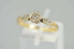 A 9CT GOLD DIAMOND RING designed as a central brilliant cut diamond within an illusion setting,