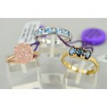 THREE GOLD GEM SET RINGS to include an 18ct yellow gold lliana three stone indicolite ring, the