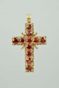 A 9CT GOLD GARNET CROSS PENDANT set with eleven circular garnets, 9ct hallmark for London 1978,