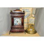 A BOXED KUNDO BLACK FORREST 400 DAY GLASS DOMED CLOCK, in need of attention together with a quartz