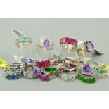 TWENTY MAINLY GEM SET RINGS to include an oval amethyst ring with white topaz shoulders, a five