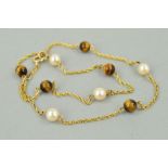 A MID TO LATE 20TH CENTURY CULTURED PEARL AND TIGERS EYE NECKLET, gemstones interspaced