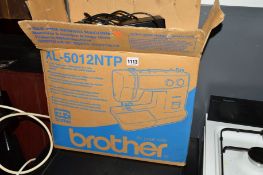 A BOXED BROTHER XL-5012NTP SEWING MACHINE and a Delta convection oven (2)