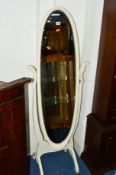 A PAINTED OVAL CHEVAL MIRROR