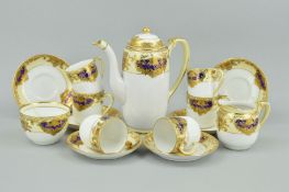 A NORITAKE COFFEE SET, cream and blue with gilt detail (hairline in two cups and sugar bowl)