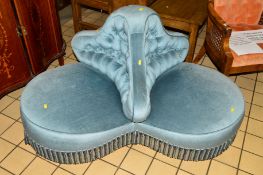 AN EDWARDIAN WALNUT TRIPLE CONVERSATION SEAT with buttoned pale blue upholstery
