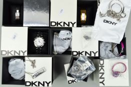A BOX OF DKNY BOXED WATCHES AND JEWELLERY to include a gentleman's stainless steel wrist watchs, a