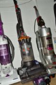 A DYSON DC27 UPRIGHT VACUUM CLEANER