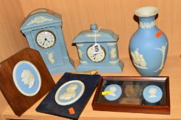 A SMALL GROUP OF WEDGWOOD BLUE JASPERWARE, to include two clocks, approximate tallest height 22.5cm,