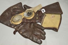 A PAIR OF WAREING FUR LINED LEATHER GAUNTLETS, some marking and wear to leather, label to left