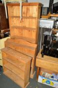 A TALL PINE OPEN BOOKCASE, two small pine open bookcases and a pine Pembroke table (4)