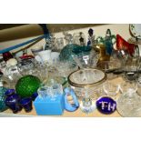A PARCEL OF GLASSWARE to include cut glass items including a silver rimmed bowl and decanters, along