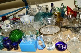 A PARCEL OF GLASSWARE to include cut glass items including a silver rimmed bowl and decanters, along