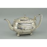 AN EARLY 19TH CENTURY SILVER TEAPOT OF OVAL FORM, engraved inscription to base, later foliate