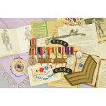 A FOLDER CONTAINING MEDALS AND EPHEMERA, to a soldier in the RASC, as follows, 1939-45, Africa (